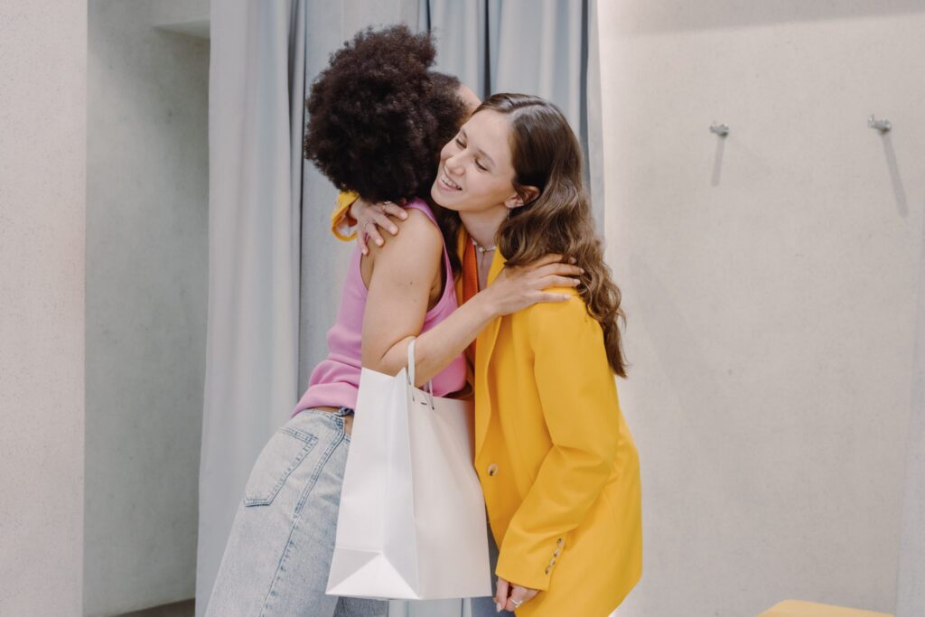 image of two women greeting each other